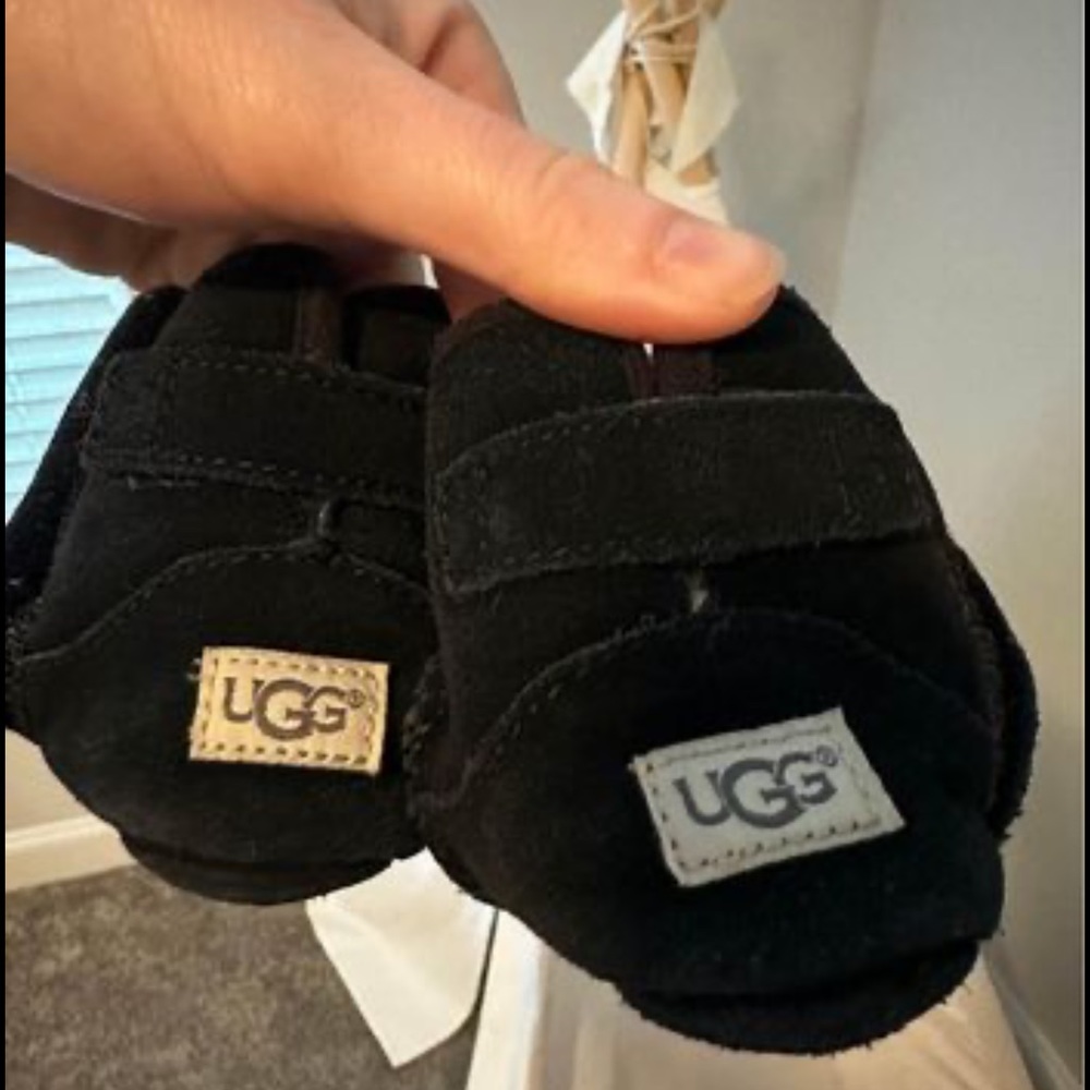 UGG. Black unisex, size 2/3. Worn on a non walking baby for one season.